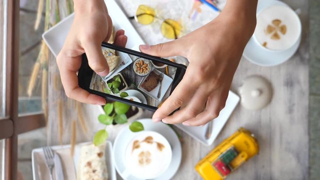 Closeup Of Female Hands Taking Food Photo With Smartphone