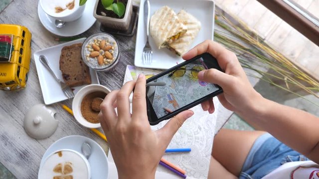 Female Hands Taking Pictures of Creative Flat Lay With Food Using Smart Phone