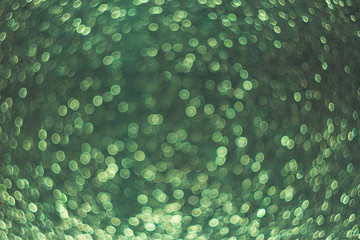 Green bokeh background, green glitter, sparkles