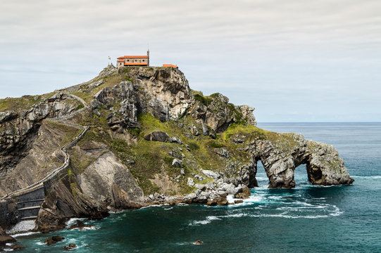 Telephoto view of the Gastelugatxe peninsula and the church on top where famous series Game of Thrones was recorded