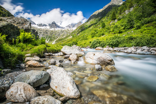 Gorezmettlenbach river with Swiss Alps (Wandenhorn, Grassengrat and Chlo Spannort) on Sustenpass, Switzerland, Europe