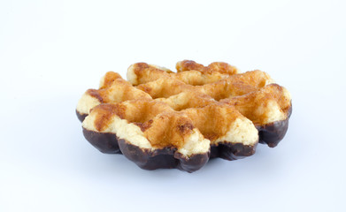Waffle with chocolate on white background.