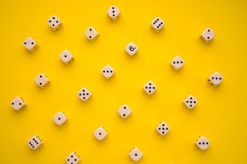 dice on a yellow background