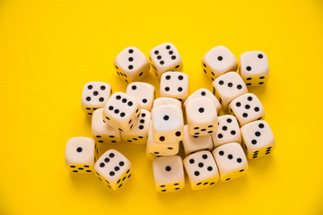 dice on a yellow background