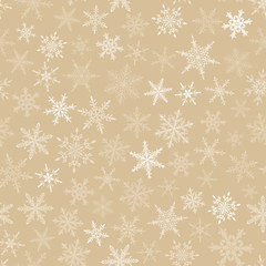 Christmas seamless pattern of snowflakes, white on beige background.