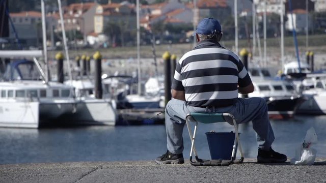 Pescador de puerto