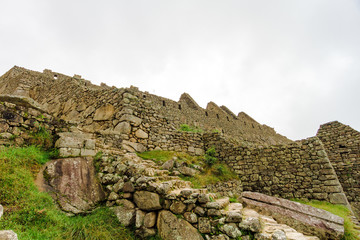 Ruins of Machu Picchu. Area of sources and residences seen from below