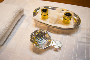 table with baptism essentials set up before baptism ceremony