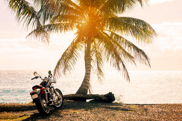 Summer, a motorcycle trip to the sea and palm trees