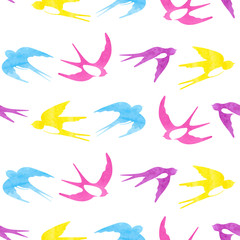 Seamless vector pattern with colorful watercolor swallows silhouettes.