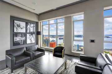 Fototapeta na wymiar Modern interior design of living area in black and grey colors