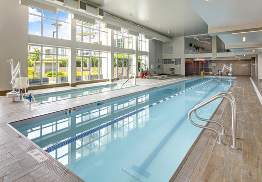 Swimming pool in luxurious apartment building.