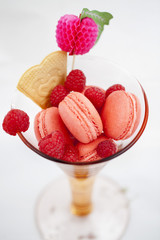 Pink macaroons in a glass vase 