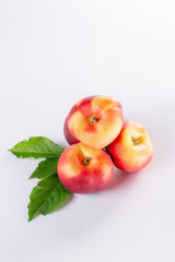 New hybrid sweet fruit nectarina platerina, flat Saturn or donut nectarine peaches close up