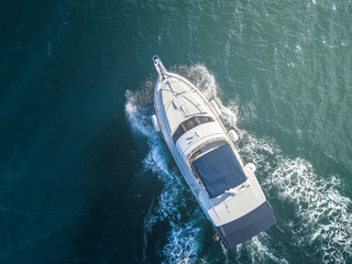 sea service team in fast speed motor boat top overhead view