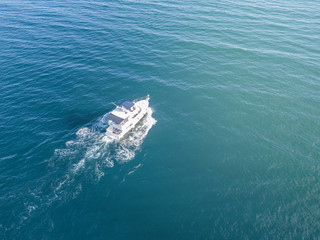 aerial view of sea emergency service team in fast speed motor boat