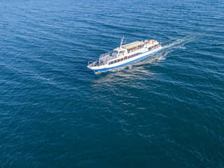 refugees imigrants in the ferry boat ship aerial view in the sea concept