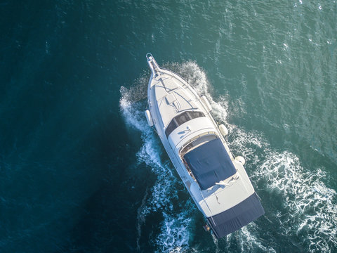 Sea Service Team In Fast Speed Motor Boat Top Overhead View