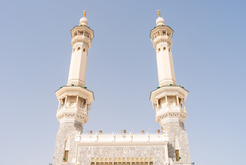 MECCA, SAUDI ARABIA - MAY 02 2018: View on Al Masjid Al Haram mosque in Mecca. Two minarets are the main entrance. Holy Kaaba is inside this mosque