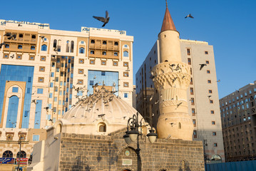 MEDINA, SAUDI ARABIA - APRIL 29 2018: Abu Bakr Mosque near Masjid An-Nabawi or Prophet Mosque in Medina. One of the sightseeing in the city. Historic place