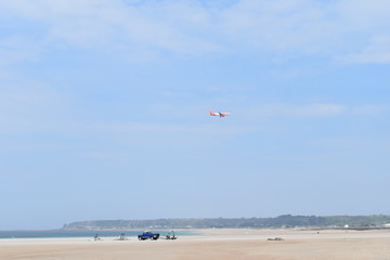 White sandy Jersey Beach, St. Brelade's, Jersey Isle, England, July, 2018