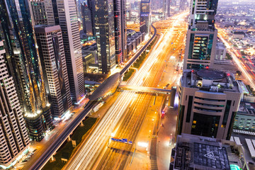 DUBAI, UAE - FEBRUARY 21, 2014. Aerial skyline view on Dubai main street - Sheikh Zayed Road and...