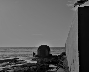 A surfer is about to conquer the waves