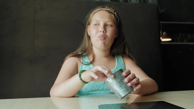 fat girl eagerly eating a French fries, concept of a healthy diet