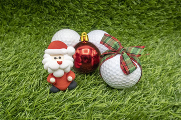 Naklejka premium Football and Santa for golfer on Christmas holiday