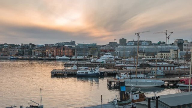 Oslo city skyline day to night sunset timelapse at Oslo Harbour, Oslo Norway 4K Time Lapse