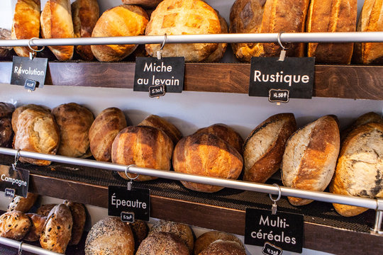 French bakery display with different kinds of bread loaves