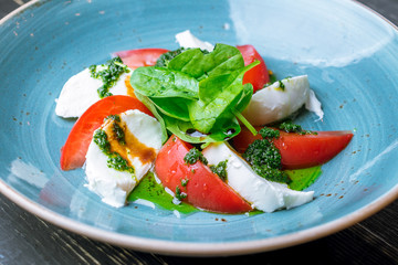 Caprese salad with mozzarella and tomato