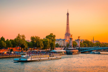 Sunset view of  Eiffel Tower, Alexander III Bridge and river Seine in Paris, France. - obrazy, fototapety, plakaty