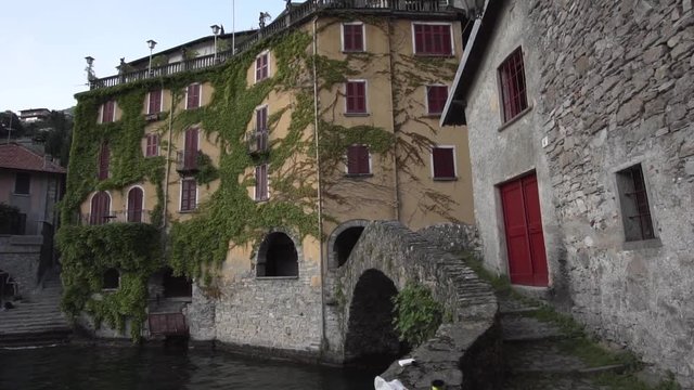 stone bridge in como lake nesso italy , a romantic place