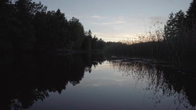In a lake environment, floating forwards in a canoo.