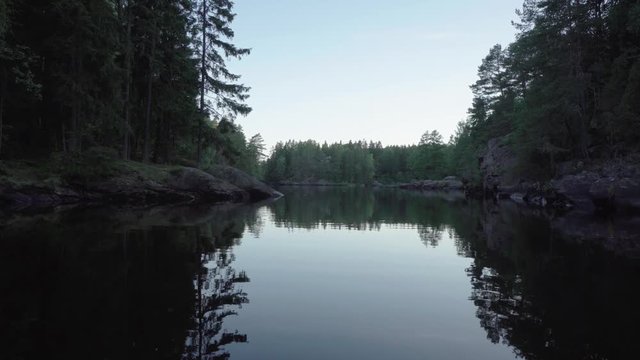 In a lake environment, floating forwards in a canoo.