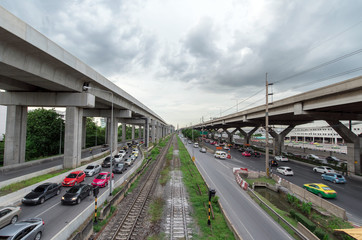 Highway Traffic at Sunset. Tilt Shift Concept Photo. Traffic in Bangkok, Thailand.
