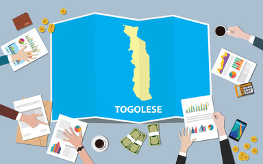 togolese africa economy country growth nation team discuss with fold maps view from top