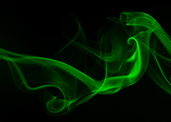 Green Smoke abstract on black background, darkness concept