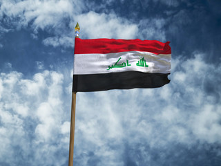 Iraq flag Silk waving flag of Iraq made transparent fabric with wooden flagpole gold spear on background sunny blue sky white smoke clouds real retro photo Countries of world 3d illustration