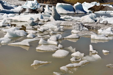 The glacier's sleeve in Iceland meets the sea and here icebergs are formed