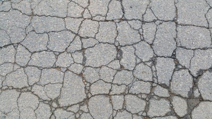 damaged old street asphalt
