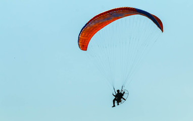 Para-motor flying in the sky