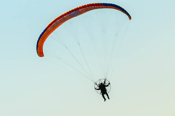 Para-motor flying in the sky