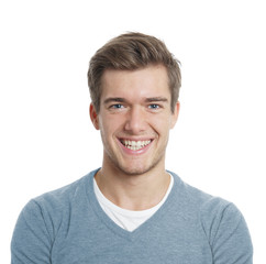 happy young man with big toothy smile isolated on white - obrazy, fototapety, plakaty