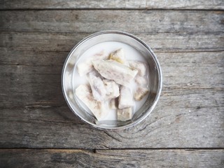 Woman using smart phone on hand and sneakers