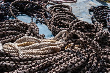 Old ropes on a blue background.