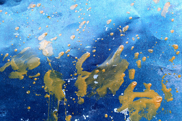 Fototapeta na wymiar abstraction background blue smeared with yellow paint