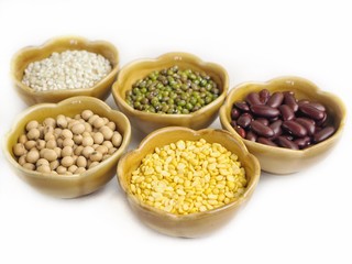 Cereal seeds of soybeans and red beans with green beans millet isolated white background