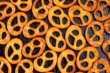 salted crispy fresh pretzels lie on the table